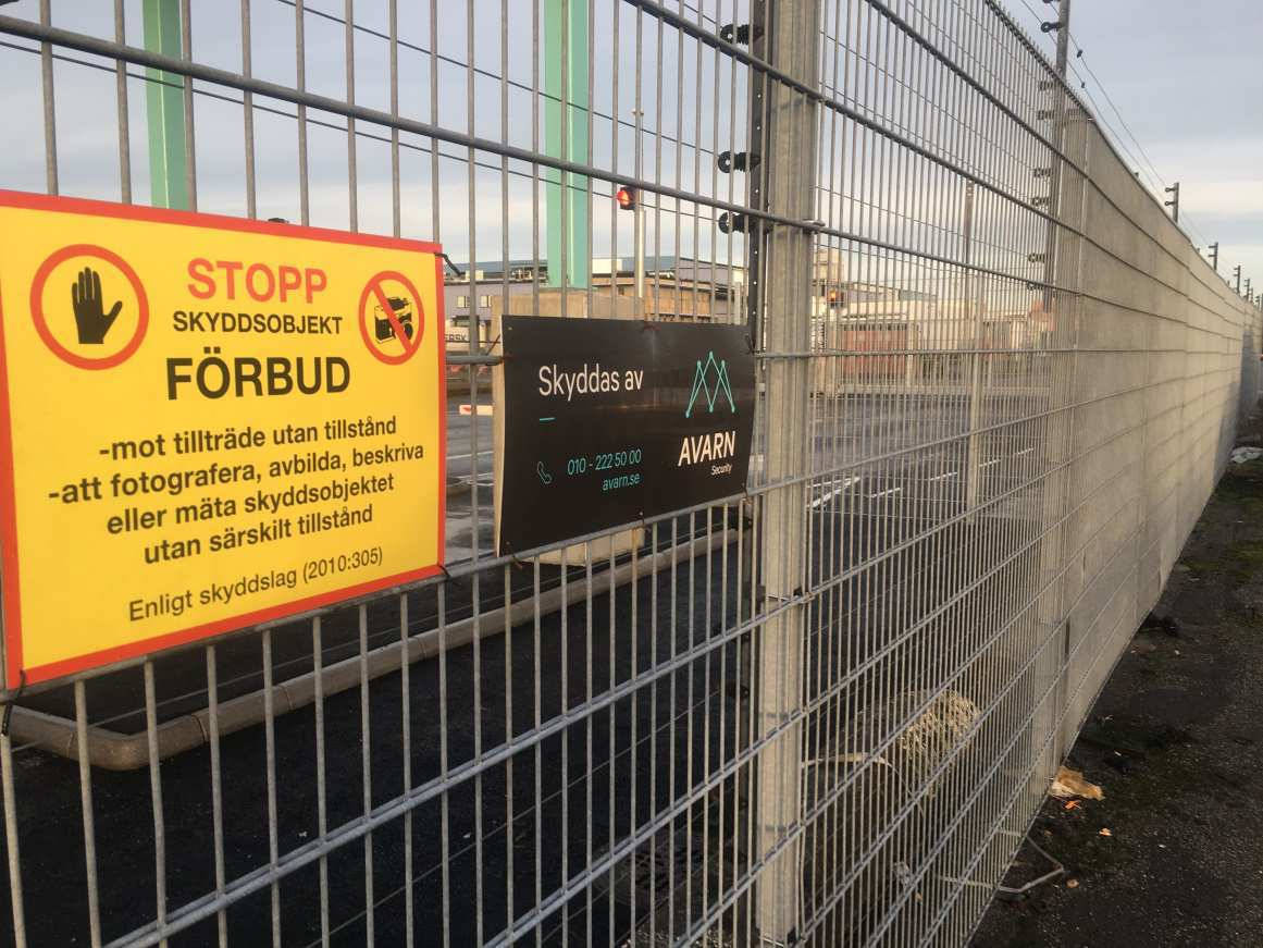 A protected port facility with restricted-access signage